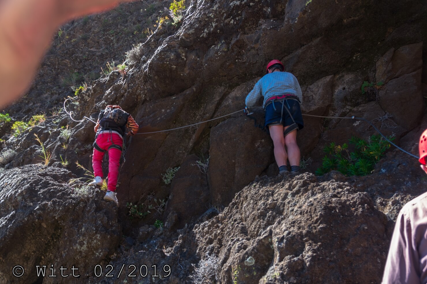 Absicherung am Klettersteig durch feste Seile