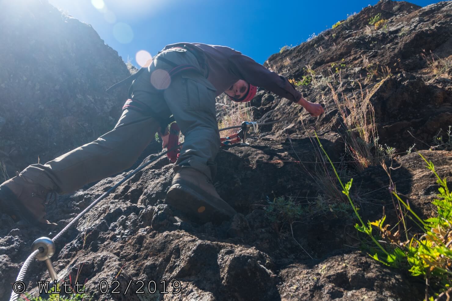 Wanderer am Klettersteig in Action